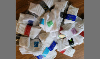 Pile of socks with the caption: so many socks! How do I choose?